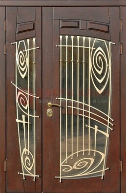 Коричневая железная дверь с большим стеклом и ковкой ДСК-203 в Сургуте