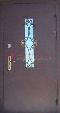 Металлическая дверь со стеклом и ковкой ДСК-77 в Пушкино