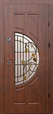 Стальная коричневая дверь с виноритом и ковкой ДВТ-82 в Сургуте